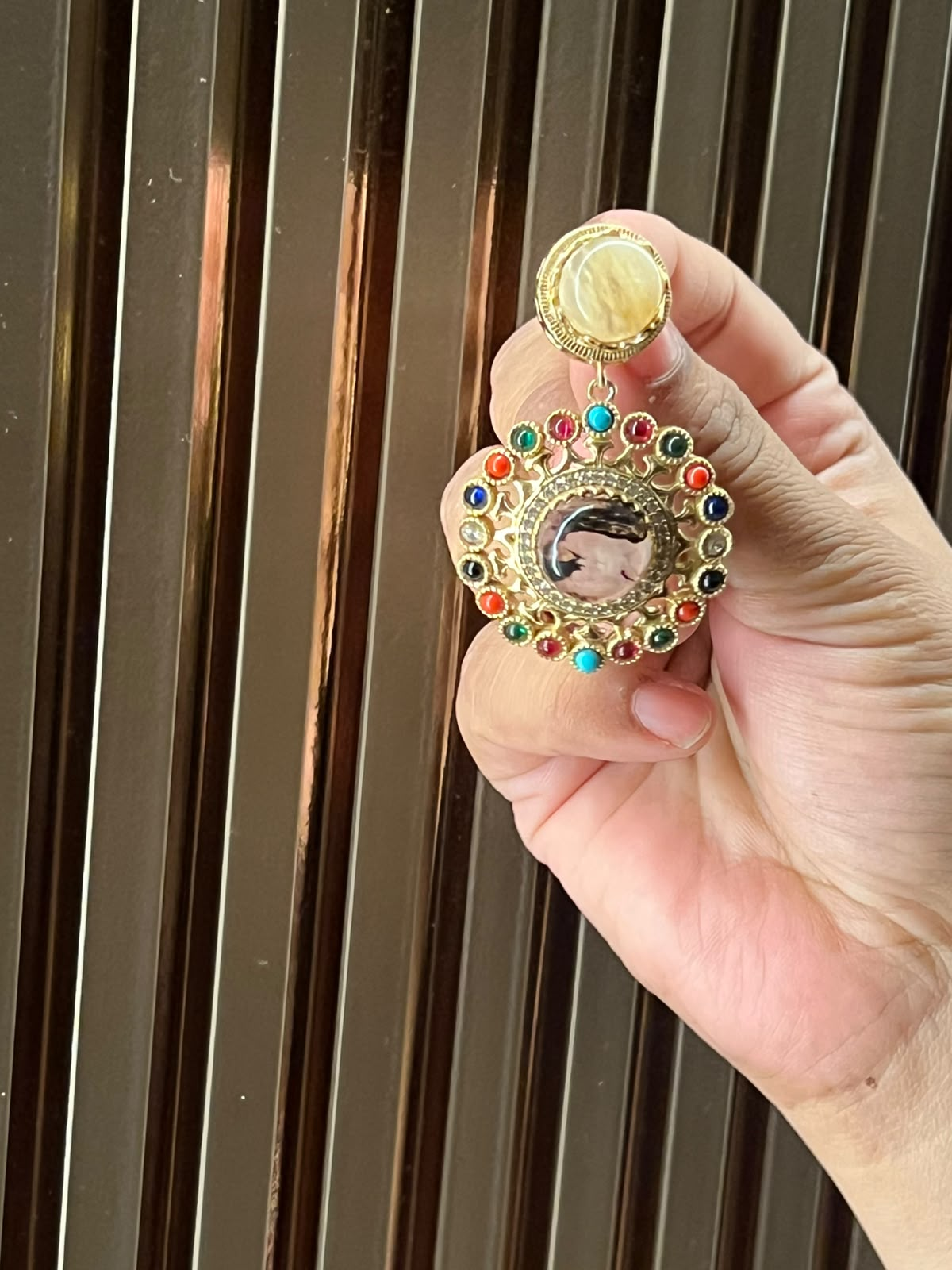 Sabyasachi inspired doublet stone work earrings close view