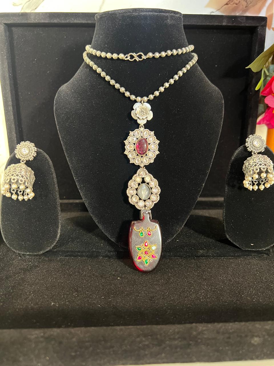 Silver-tone long statement necklace set with jhumka earrings