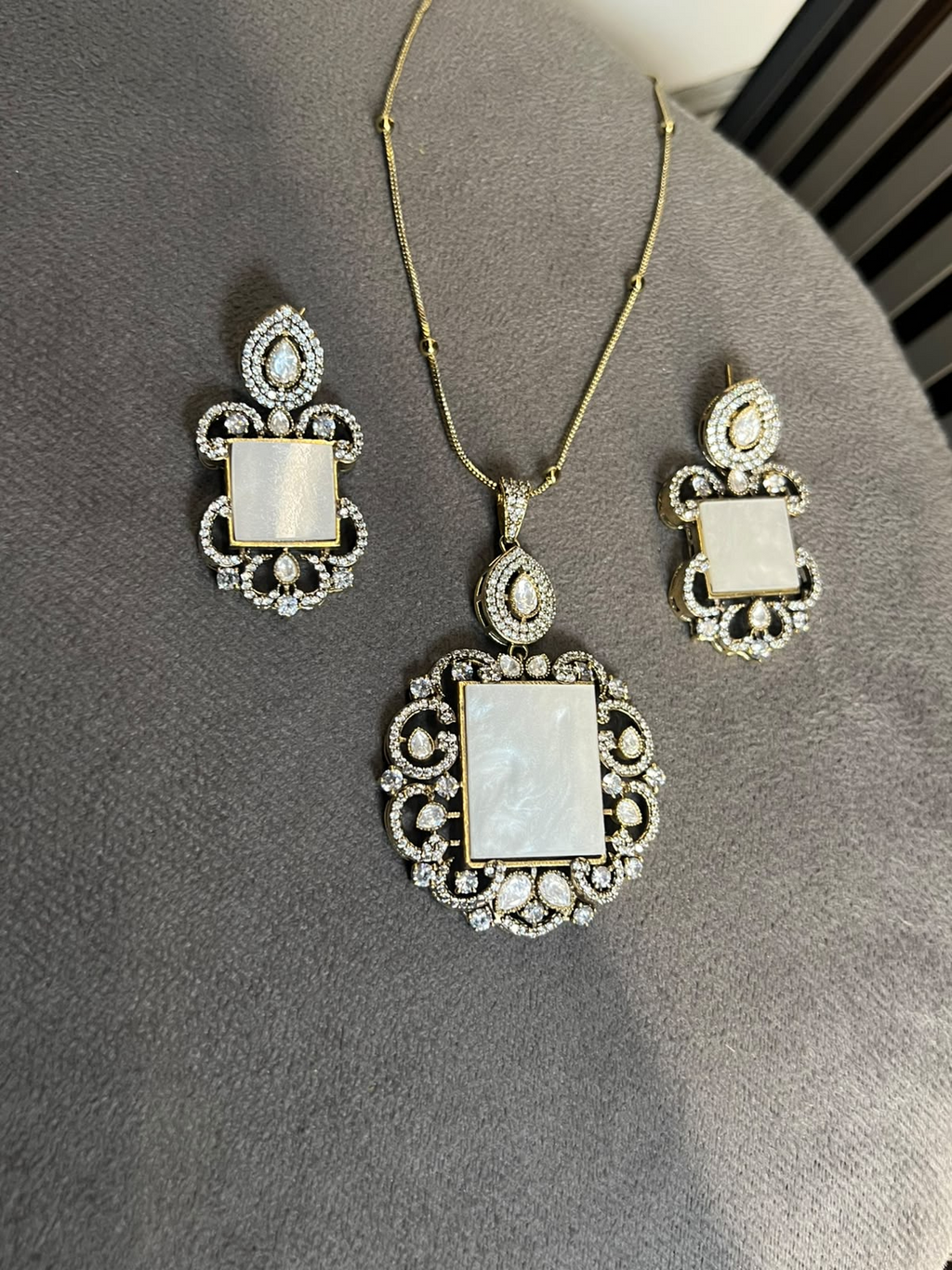 Semi precious stone and CZ moissanite work chain pendant set close view